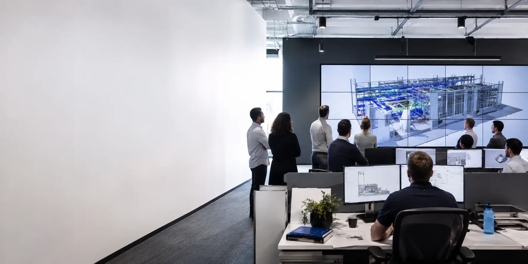 Digital engineering team coordinating ELV and building systems